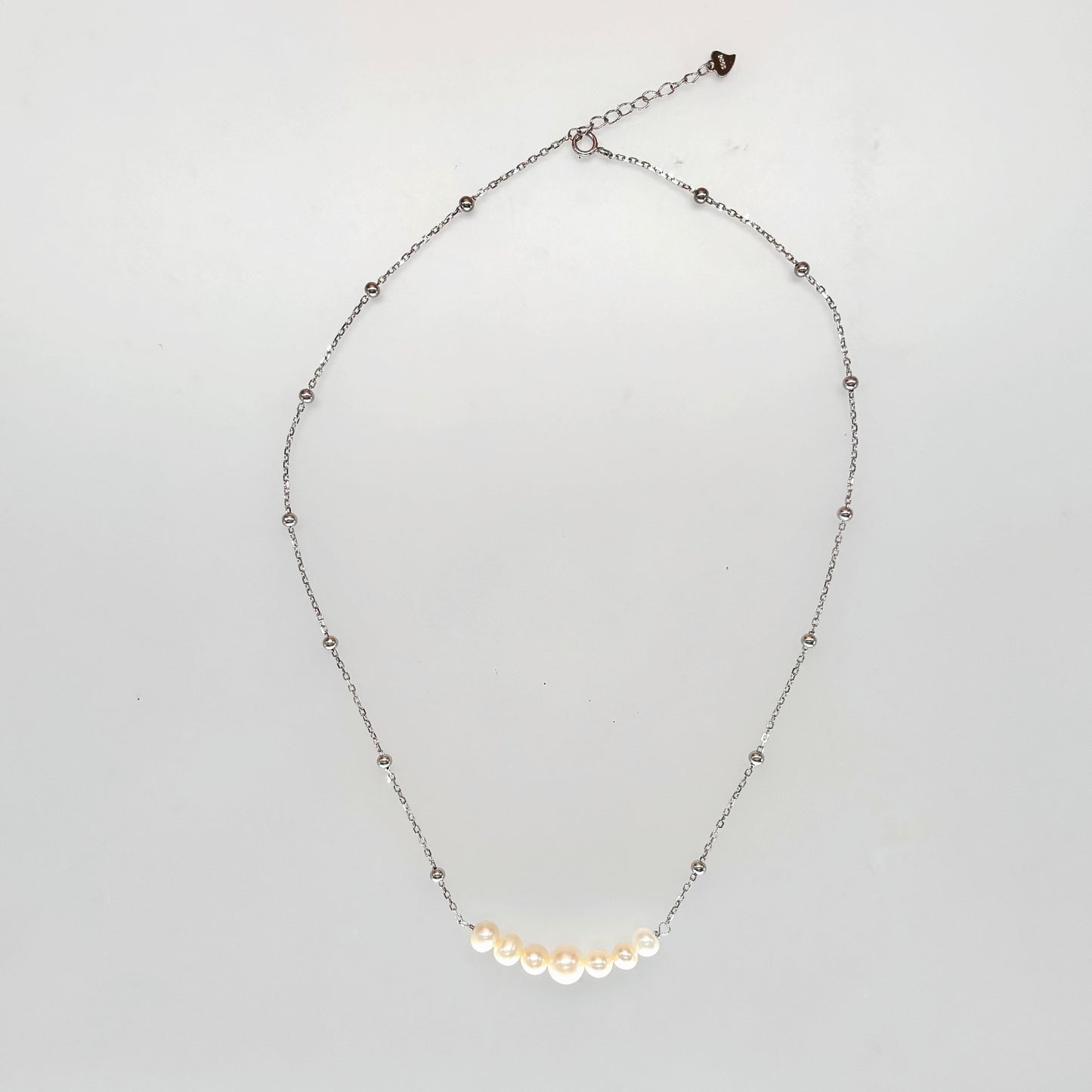 “Elegance Curve Pearl Necklace in Italian 92.5 Silver”