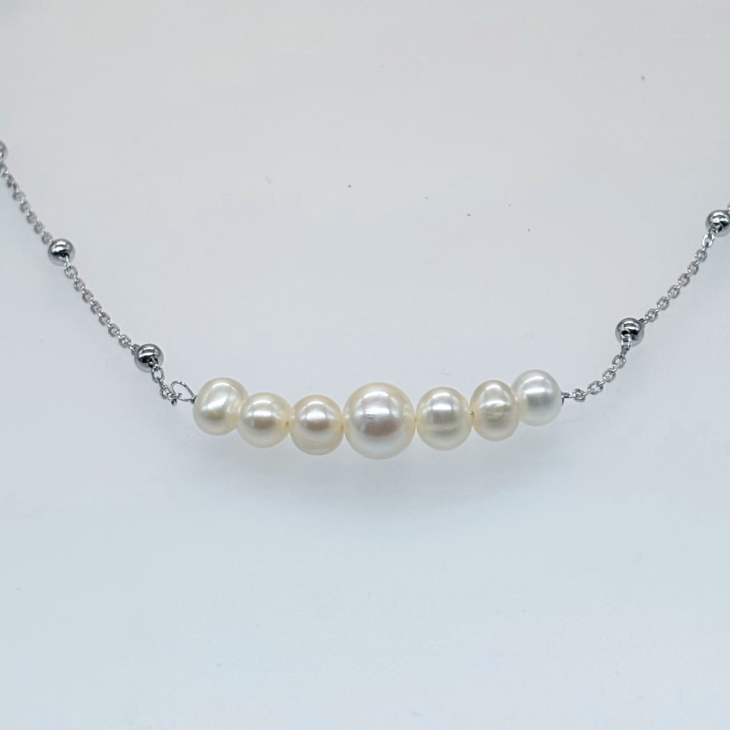 “Elegance Curve Pearl Necklace in Italian 92.5 Silver”