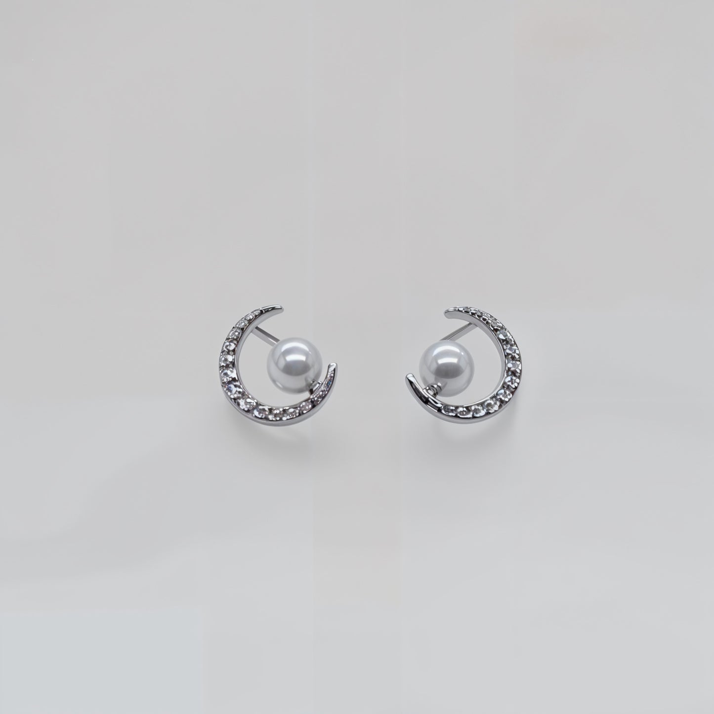 “Celestial Pearl Crescent Earrings in Italian 92.5 Silver”