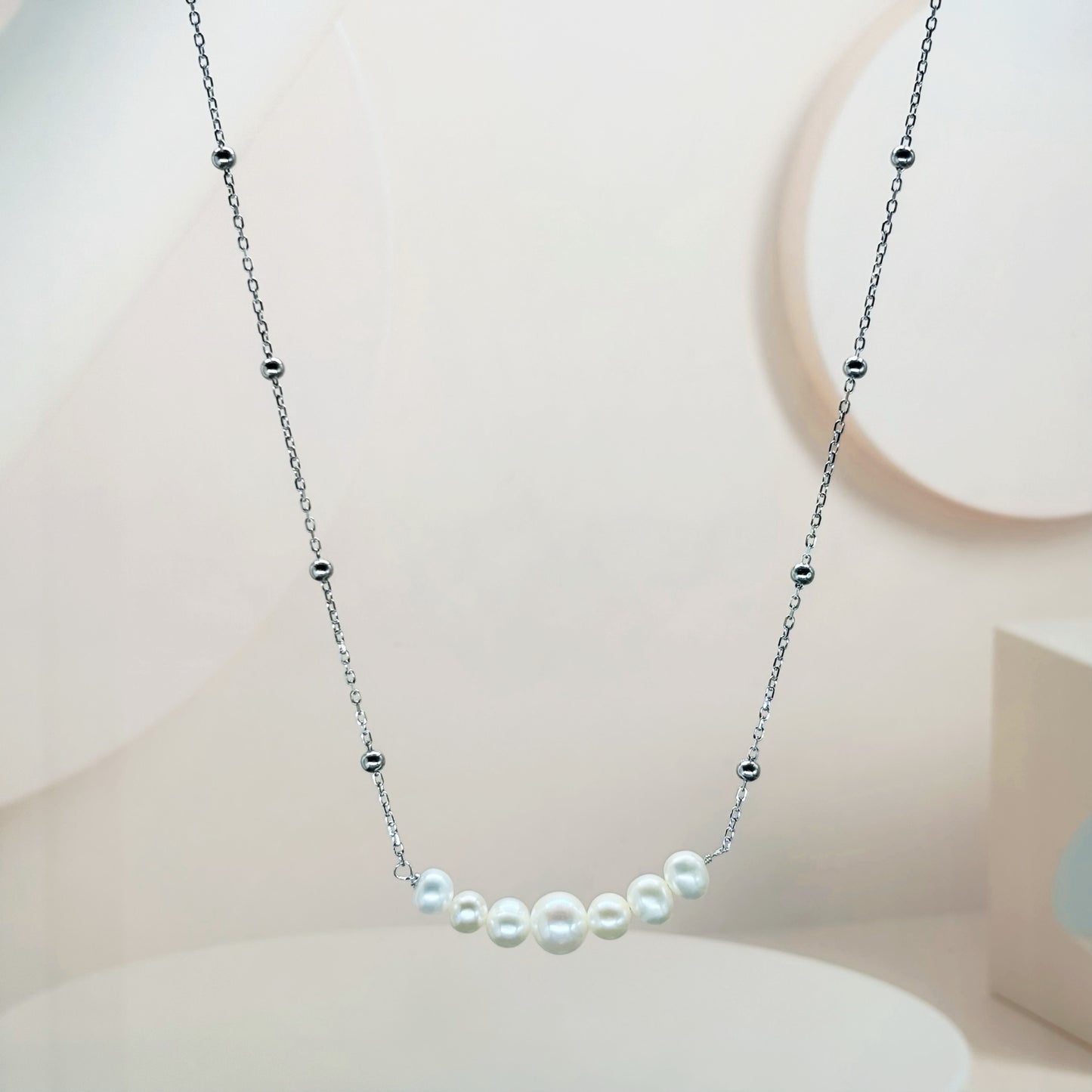 “Elegance Curve Pearl Necklace in Italian 92.5 Silver”