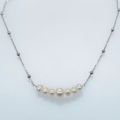 “Elegance Curve Pearl Necklace in Italian 92.5 Silver”