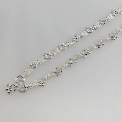 unique charm with tiny dangling beads