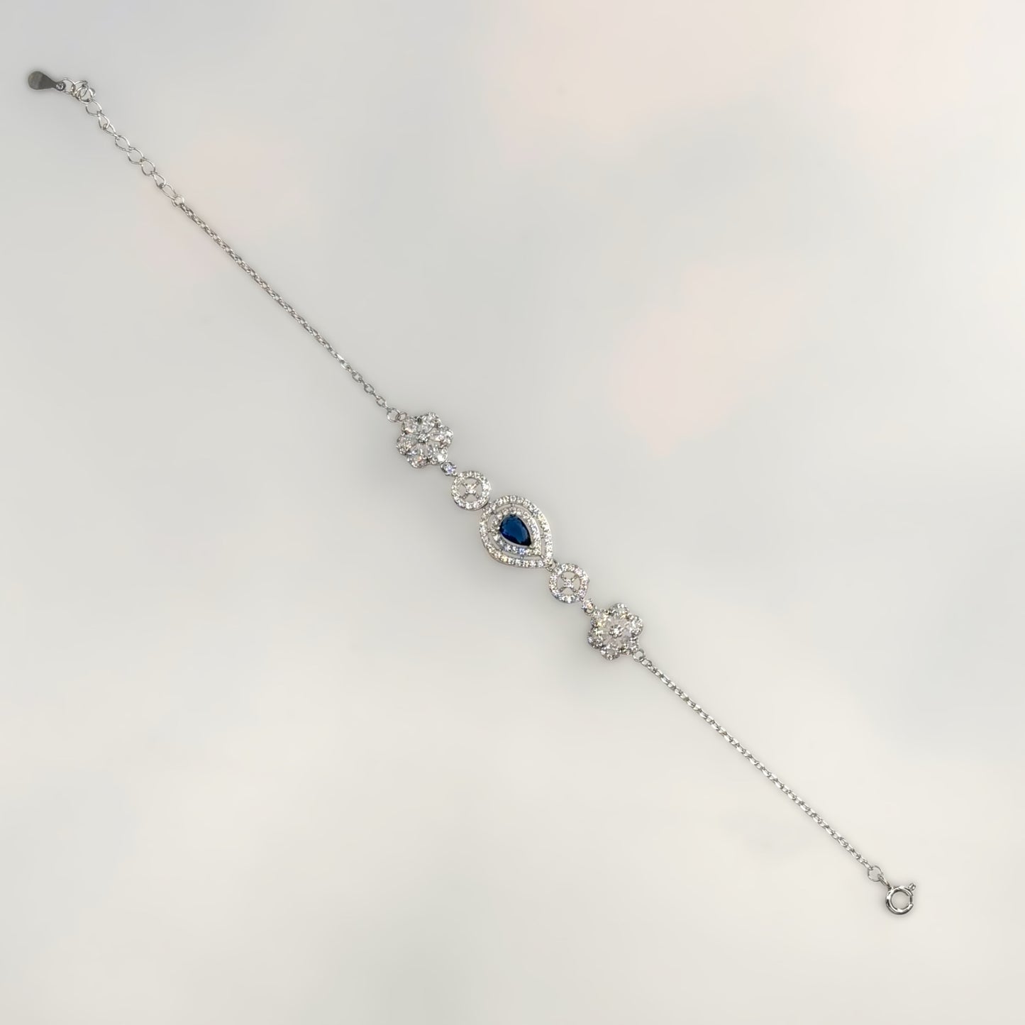 Royal Sapphire Droplet Halo Bracelet in Italian 92.5 Silver