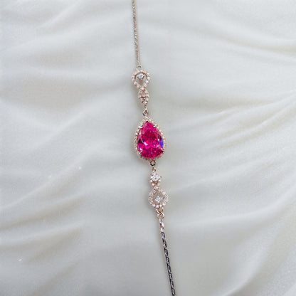 Pink Teardrop Halo CZ Bracelet in Italian 92.5 Silver