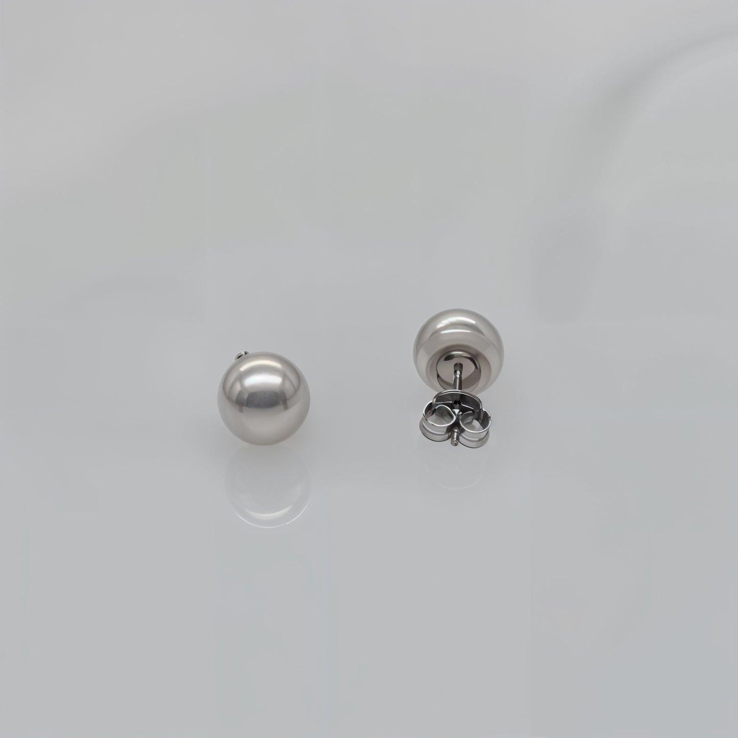 Elegance Pearl Glow Studs in Italian 92.5 Silver”