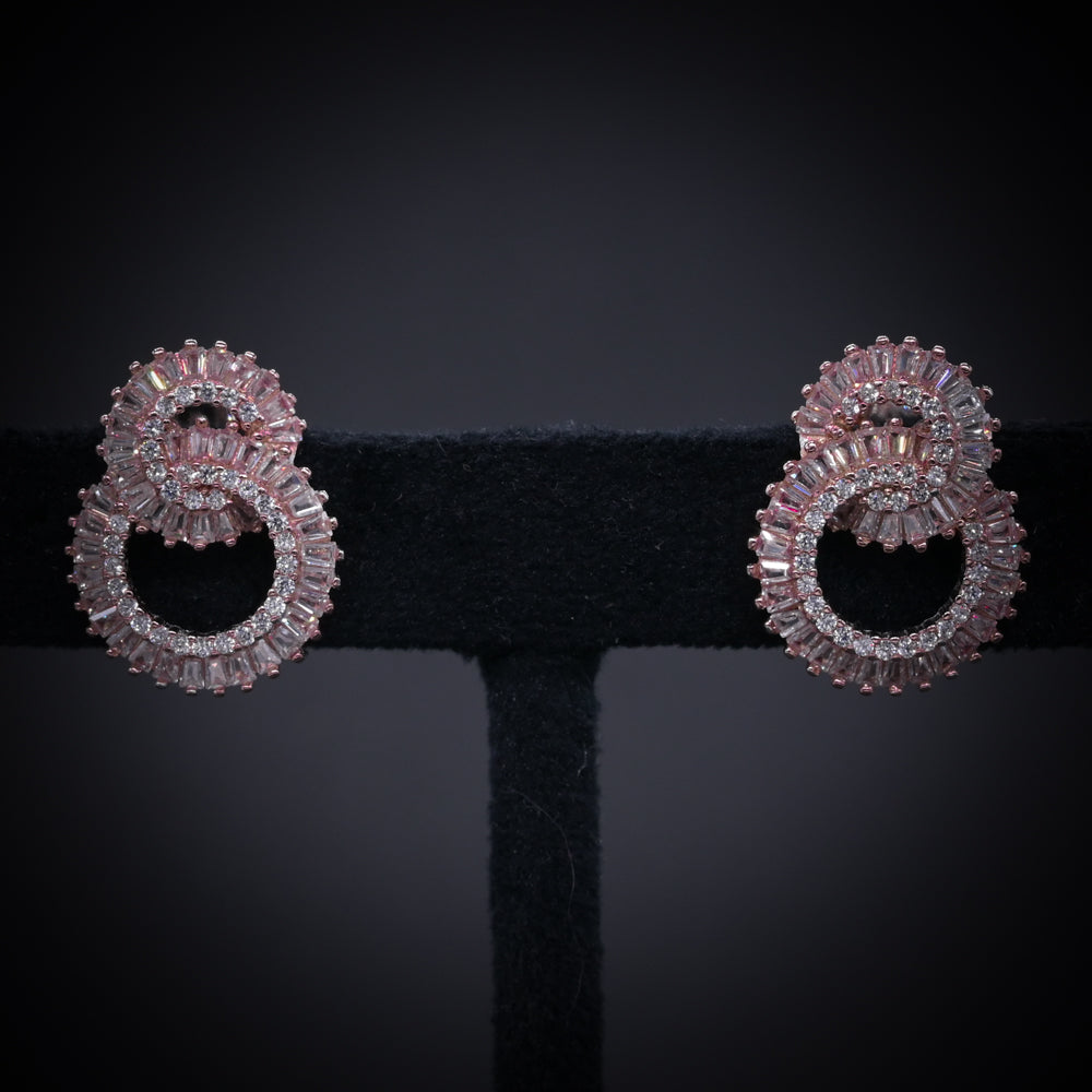 “Eternal Luxe Rose Gold Spiral Earrings – Italian 92.5 Silver with Baguette CZ Brilliance”