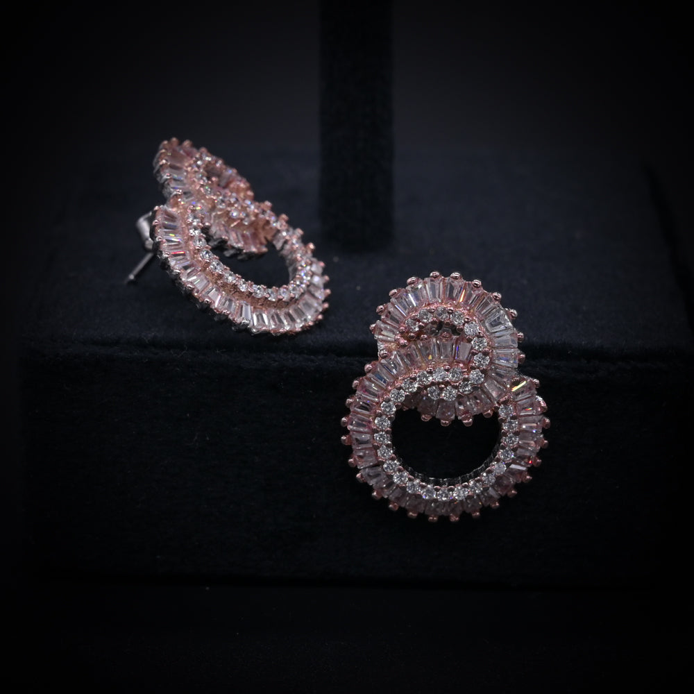 “Eternal Luxe Rose Gold Spiral Earrings – Italian 92.5 Silver with Baguette CZ Brilliance”