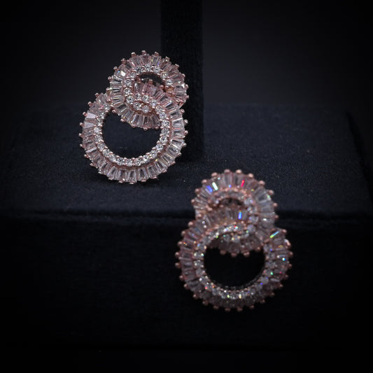“Eternal Luxe Rose Gold Spiral Earrings – Italian 92.5 Silver with Baguette CZ Brilliance”