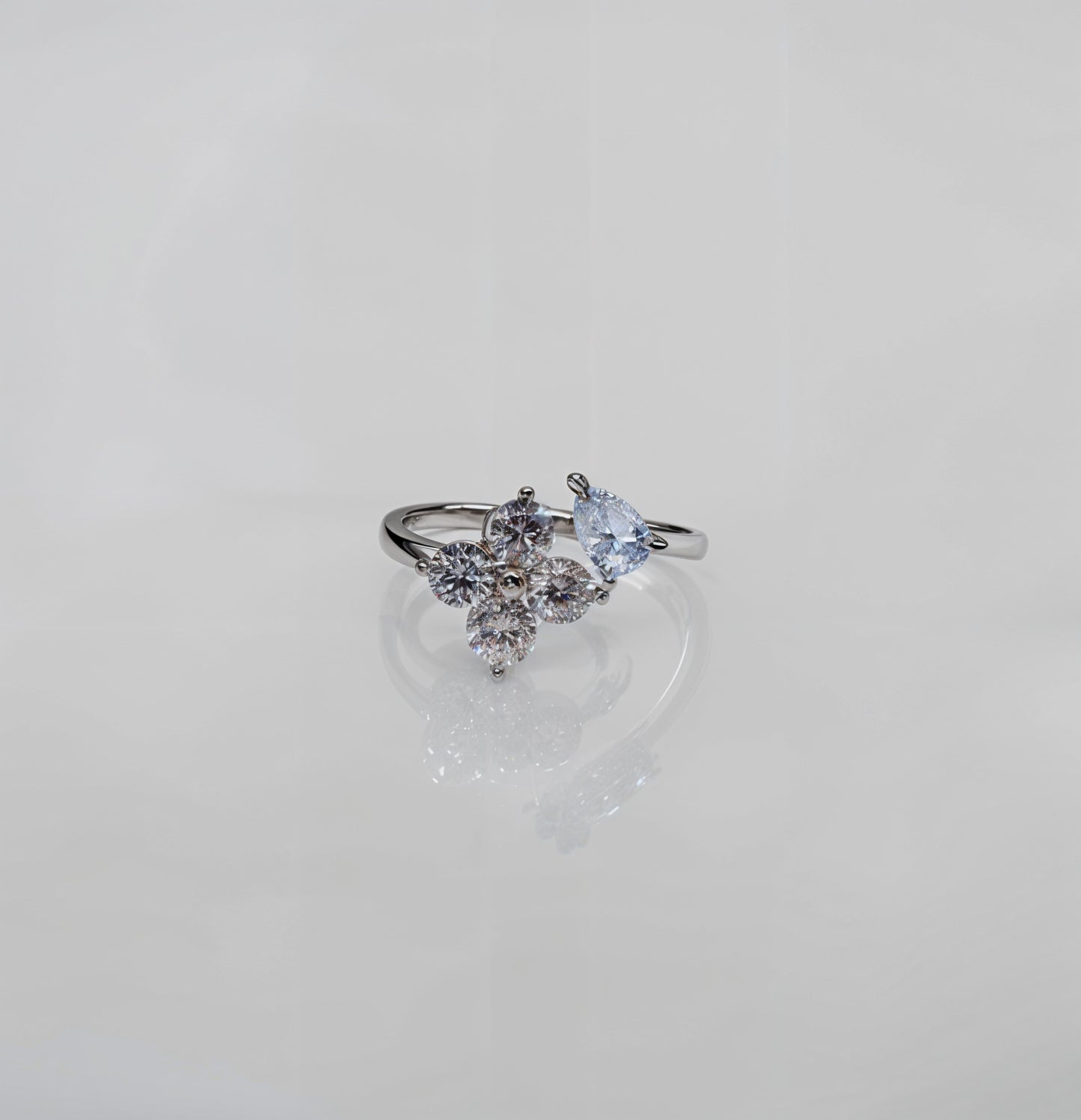 “Floral Radiance Adjustable Ring – Italian 92.5 Silver with CZ Brilliance”